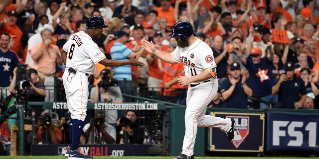 Evan Gattis #11 of the Houston Astros rounds the bases after hitting a solo home run in the fourth inning of Game 7 of the American League Championship Series against the New York Yankees at Minute Maid Park on Saturday, October 21, 2017 in Houston, Texas.