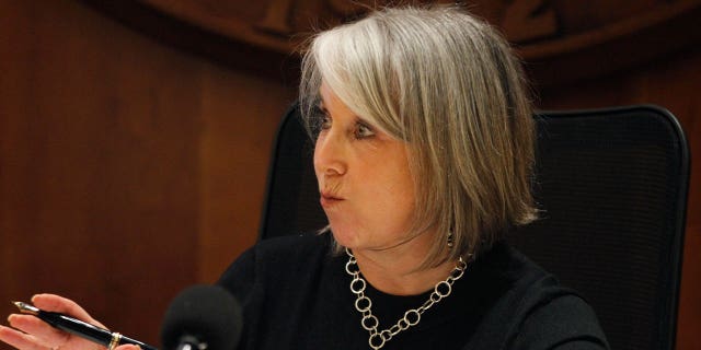 New Mexico Gov. Michelle Lujan Grisham speaks on April 5, 2023, in Santa Fe. Grisham is making leadership changes at the state’s embattled child welfare agency as New Mexico struggles to tackle its high repeat rate of child abuse cases.