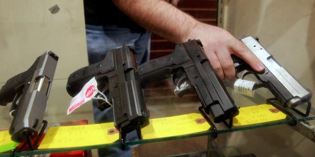 Handguns inside a display case at a firearms store on Friday Jan. 13, 2017, in Walnut Creek, California.