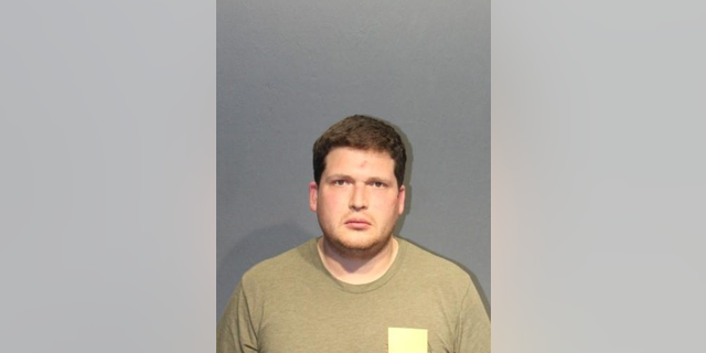 Christopher Paul Hetherington, 33, was stationed in Norfolk, Virginia as a surface warfare officer when he was arrested.