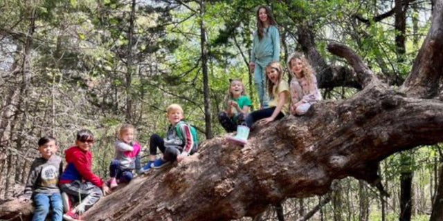Home-school kids are learning through hands-on outdoor education at a Barefoot University class. Every year the school follows a different rhythm of learning. This year was rhythm fire, which focuses on learning survival skills in nature.