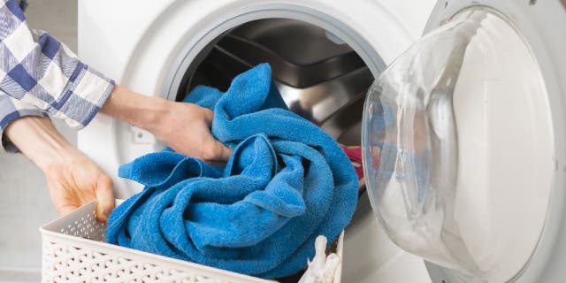 Towels get thrown in washing machine
