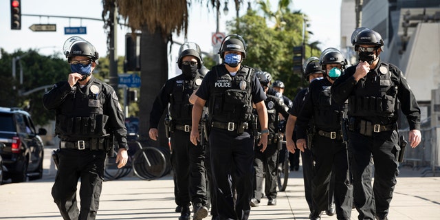 January 20, 2021: Los Angeles Police Department (LAPD) officers march in formation.