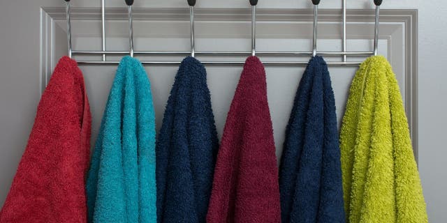 Bath towels should be hung up to air dry after each use to limit bacteria buildup.