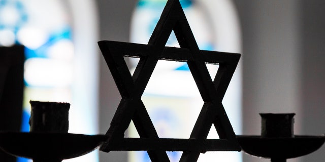 Pink Floyd founder condemned for wearing SS officer uniform 'where Jews were deported by the Nazis' 3 Jewish star