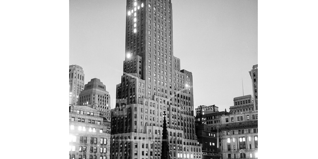 A photo from 1952 shows one New York City skyscraper illuminated with a cross on Easter weekend.