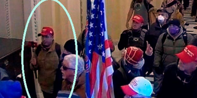Former Infowars video editor Samuel Montoya (circled) has been sentenced to four months of home detention for his role in the Jan. 6, 2021 Capitol riot.