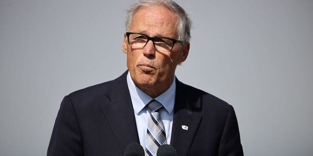 Washington Governor Jay Inslee speaks October 6, 2022 in San Francisco, California. Inslee supports a housing bill legalizing duplexes and quadruplexes in Washington, which would ease the state's housing crisis.