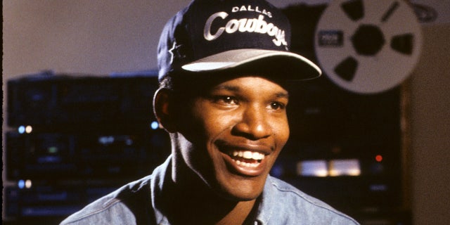 Jamie Foxx wears Dallas Cowboys hat and denim shirt during interview