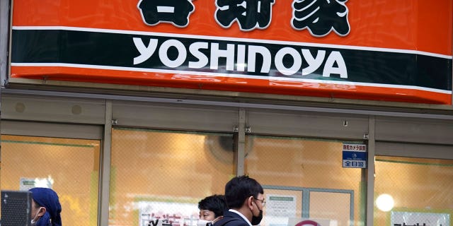 A signboard of a Yoshinoya restaurant, a fast-food beef bowl chain, is seen April 5, 2023, in Tokyo. Japanese police arrested two male suspects in a series of food pranks known as "sushi terrorism."