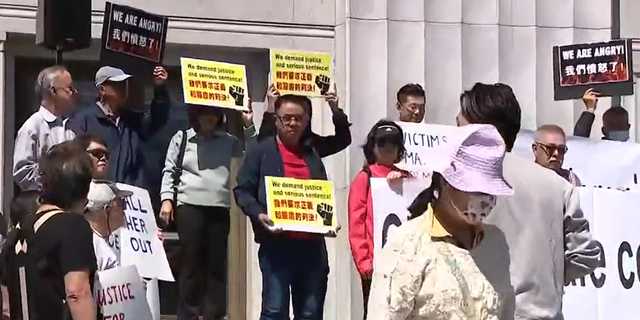 Protesters in support of Jasper Wu's family show up outside the Alameda Court courthouse.