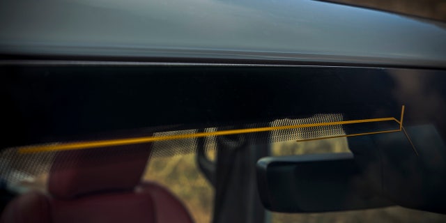New 2024 Jeep Wrangler has an antenna integrated into the windshield.