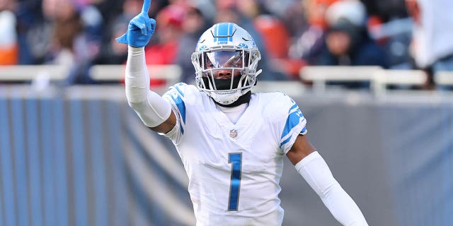 Jeff Okudah of the Detroit Lions celebrates an interception against the Chicago Bears at Soldier Field Nov. 13, 2022, in Chicago.