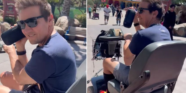 Jeremy Renner listened to music while roaming around amusement park with his family.