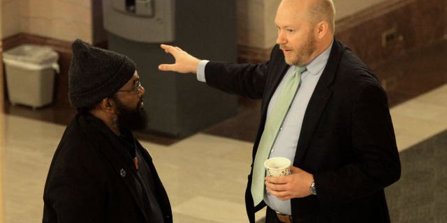 Kansas Democratic State Rep. Marvin Robinson (left) has come under fire after voting alongside his fellow Republicans to overrule Governor Laura Kelly's veto to ban biological men in women's sports and feminine.