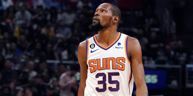 Kevin Durant stands on the basketball court