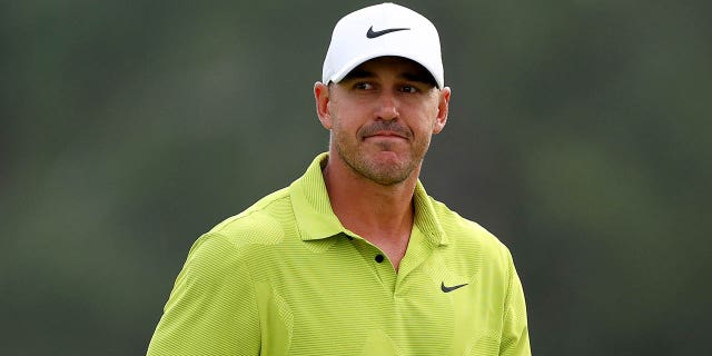 Brooks Koepka reacts to his birdie on the 18th green during the first round of the 2023 Masters Tournament at Augusta National Golf Club in Augusta, Georgia, on Thursday.