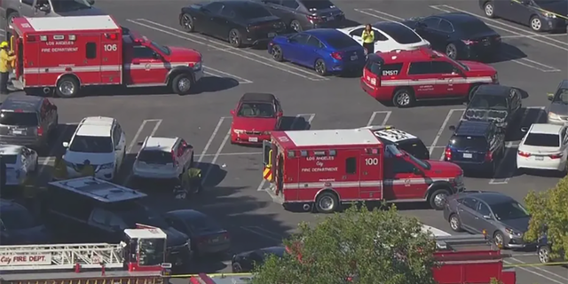 Los Angeles Fire Department vehicles responded to a shooting scene in a Trader Joe's parking lot in West Hills. 
