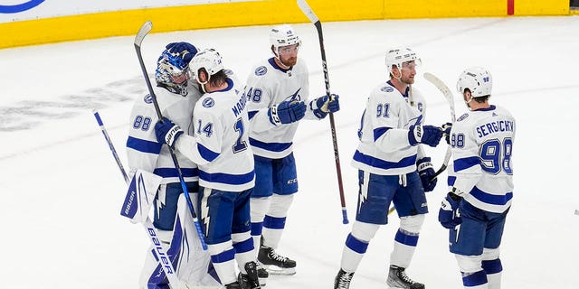 Andrei Vasilevskiy #88 of the Tampa Bay Lightning celebrates with teammate Pat Maroon #14 after defeating the Toronto Maple Leafs in Game One of the First Round of the 2023 Stanley Cup Playoffs at the Scotiabank Arena on April 18, 2023 in Toronto, Ontario, Canada