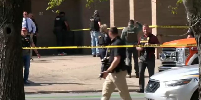 Louisville police have said the shooting outside the college building was unrelated to the shooting that unfolded just hours earlier inside an Old National Bank in the city.