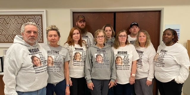 Madeline Kingsbury's family wears custom-made sweatshirts during their search with her description and contact information for tips.