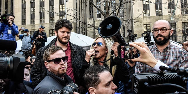 Rep. Marjorie Taylor Green, a Georgia Republican, belted out support for Trump during a rally in front of the Manhattan courthouse.