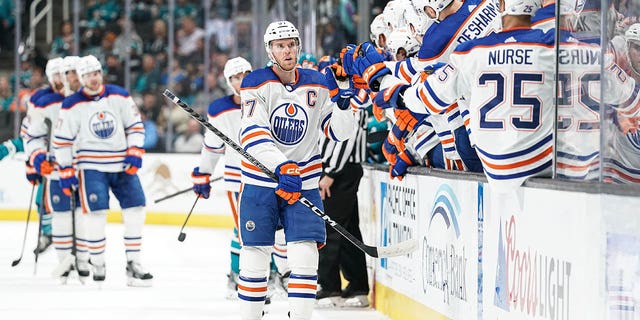 Connor McDavid #97 of the Edmonton Oilers celebrates scoring a goal in the first period against the San Jose Sharks at SAP Center on April 8, 2023 in San Jose, California. 
