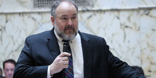 State Del. Luke Clippinger speaks during a debate on April 6, 2023, in Annapolis, Maryland, on a bill that gives the state's attorney general authority to bring certain criminal charges against cops.