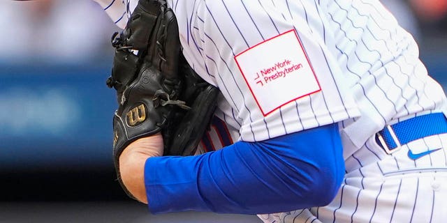 New York Mets pitcher Adam Ottavino wearing the NewYork-Presbyterian patch on a sleeve during a game against the Miami Marlins April 7, 2023, at Citi Field in Flushing, N.Y. 