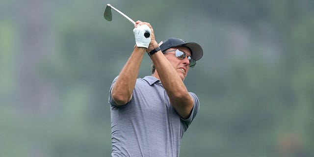 Phil Mickelson of The United States plays his second shot on the 14th hole during practice prior to the 2023 Masters Tournament at Augusta National Golf Club on April 4, 2023 in Augusta, Georgia. 