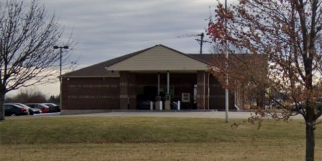 When officers went to this Goppert Financial Bank in Pleasant Hill, Missouri, they were given the bank suspect and vehicle details.
