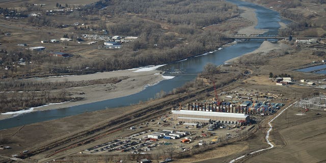 A judge has revoked an under-construction Montana gas plants air quality permit over climate concerns.