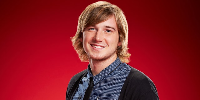 Morgan Wallen wears a cardigan and tie for The Voice promotional pictures