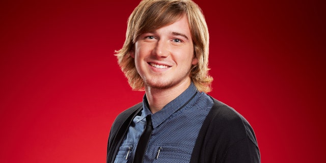 Morgan Wallen wears a cardigan and tie for The Voice promotional pictures