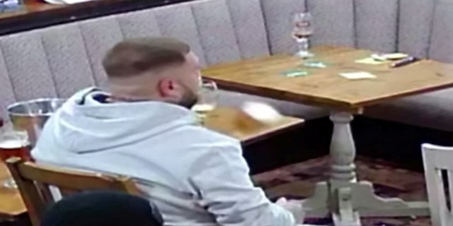 glass topples off table pushed by ghost