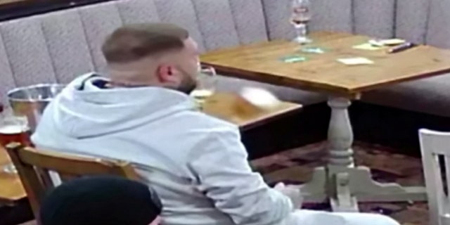 glass topples off table pushed by ghost