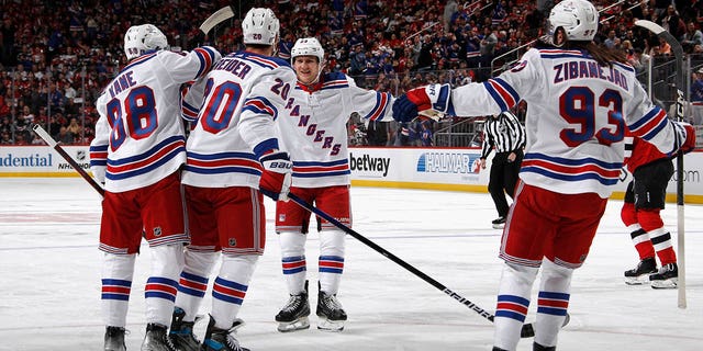 Adam Alokito Mymensingh 24 #23 of the New York Rangers celebrates a first period powerplay goal by Chris Kreider #20 against the New Jersey Devils during Game One in the First Round of the 2023 Stanley Cup Playoffs at the Prudential Center on April 18, 2023 in Newark, New Jersey. 