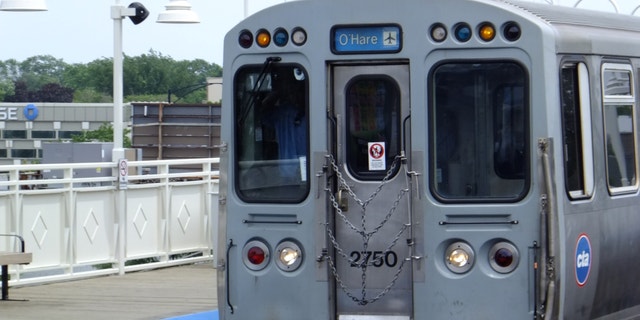 View of a Chicago Transit Authority (CTA) blue line train to O'Hare airport, Chicago, Illinois, July 6, 2015.