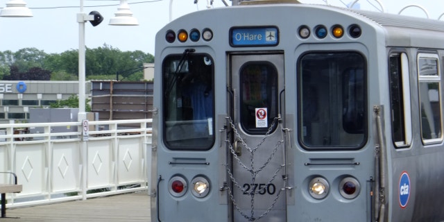 View of a Chicago Transit Authority (CTA) blue line train to O'Hare airport, Chicago, Illinois, July 6, 2015.