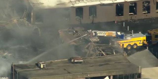 A fire truck can be seen at the site of a warehouse fire in West Easton, Pennsylvania, Tuesday morning.