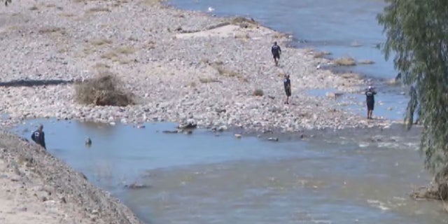 Technical rescuers with the Phoenix Fire Department searched miles of river bank for the missing men.