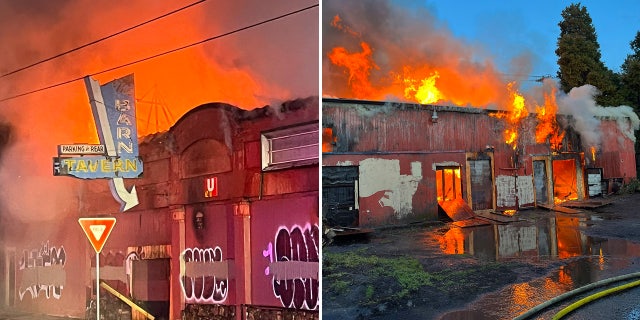 Flames pour out of an abandoned tavern in Portland, Oregon