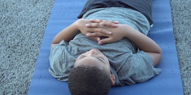 Baltimore boy meditates