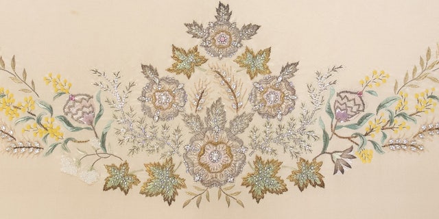 This detailed embroidery fabric sample connected to Queen Elizabeth II's coronation gown is going up for auction on May 16.