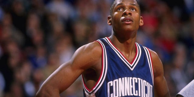 Guard Ray Allen #34 of the Connecticut Huskies pauses on the court during a break in the action against the Georgetown Hoyas in this Big East match-up at the USAir Arena in Washington, D.C. Georgetown defeated UConn 77-65.