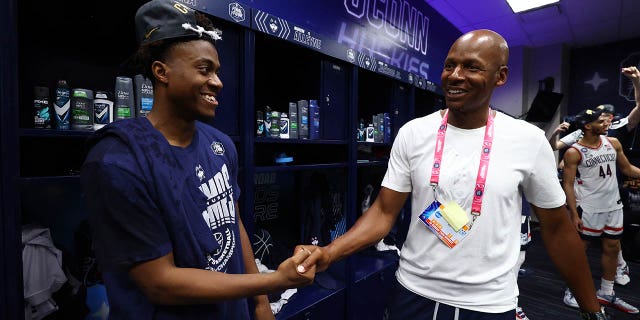 Alumni Ray Allen shakes hands with Nahiem Alleyne #4 of the Connecticut Huskies after they defeated the San Diego State Aztecs to win the NCAA Men's Basketball Tournament National Championship at NRG Stadium on April 03, 2023 in Houston, Texas. 