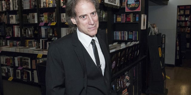 Richard Lewis poses at a book signing