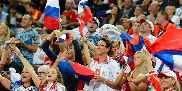 Russia fans cheer on their team during a men's basketball quarterfinal game during the London 2012 Olympic Games at North Greenwich Arena Aug. 8, 2012, in London.  