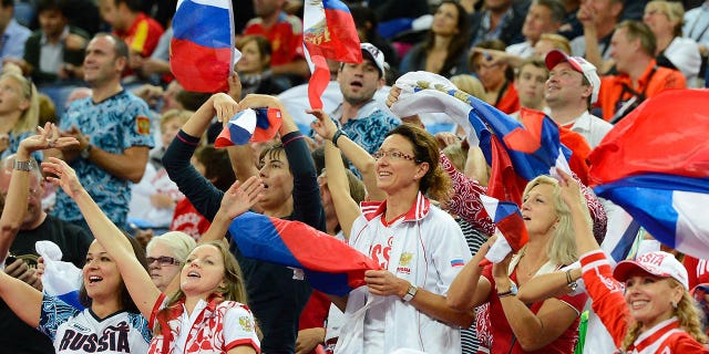 Russia fans cheer on their team during a men's basketball quarterfinal game during the London 2012 Olympic Games at North Greenwich Arena Aug. 8, 2012, in London.  