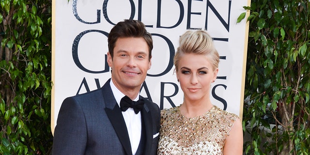 Julianne Hough and Ryan Seacrest posing together